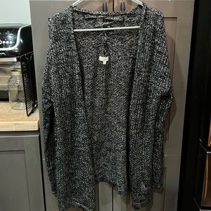 Black and gray sweater open down the front mud size large